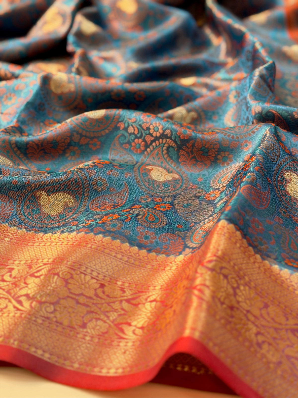 Teal Blue Silk Georgette Pashmina Saree with Floral Paisley Design