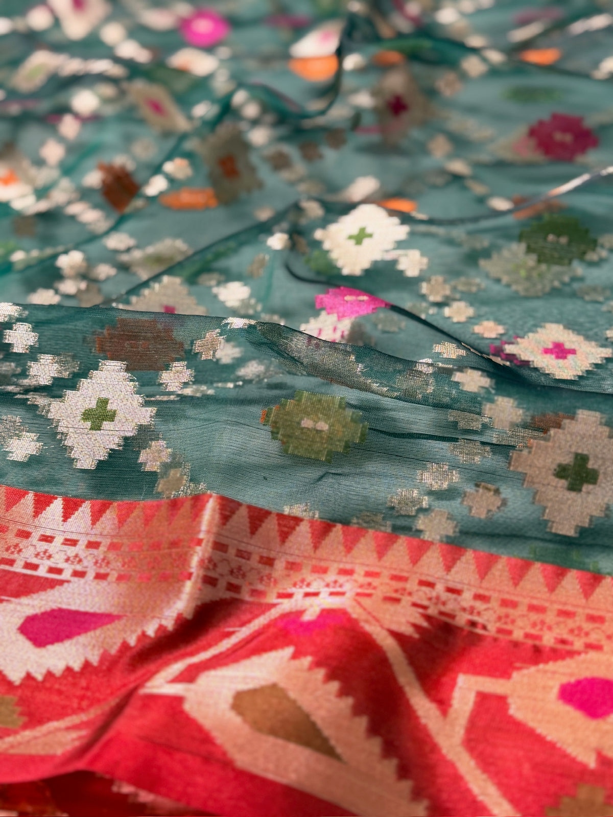 Deep Teal Green Organza Jamdani Patola Saree with Red Geometric Border